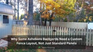 Custom fence layout in an Asheboro NC backyard with sloped lawn, gate access, and privacy fencing
